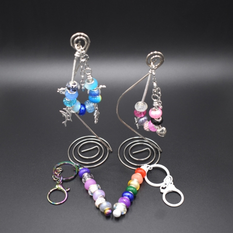 Bracelets and keychains maid with charms and oversized beads.