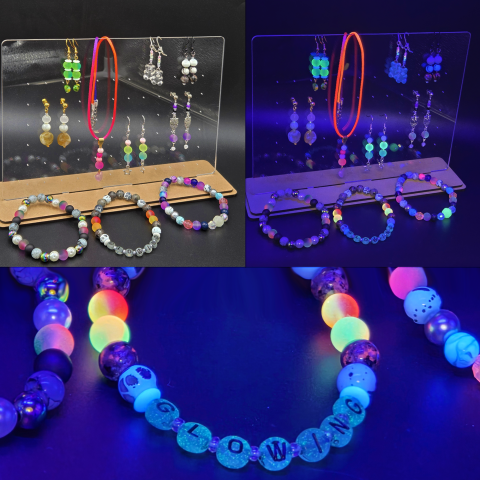 earring display with bracelets with some beads glowing under UV light