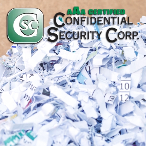 photo of a pile of shredded paper with shred company logo
