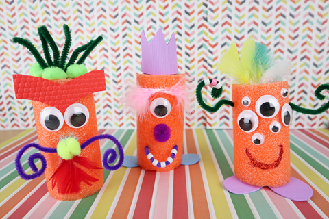 Monsters made of pool noodle segments and craft supplies