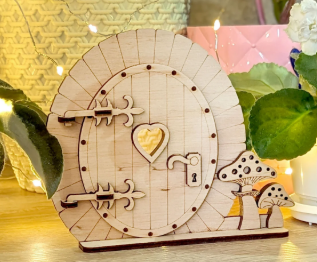 Fairy door with heart and mushroom details