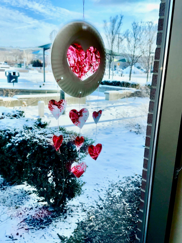 heart shaped suncatcher in a window