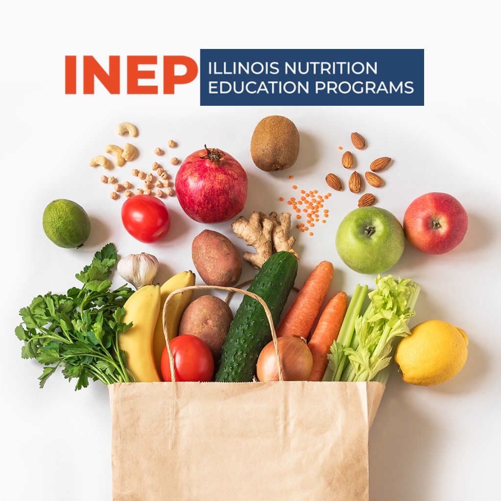 paper bag with fruits and vegetables spilling out