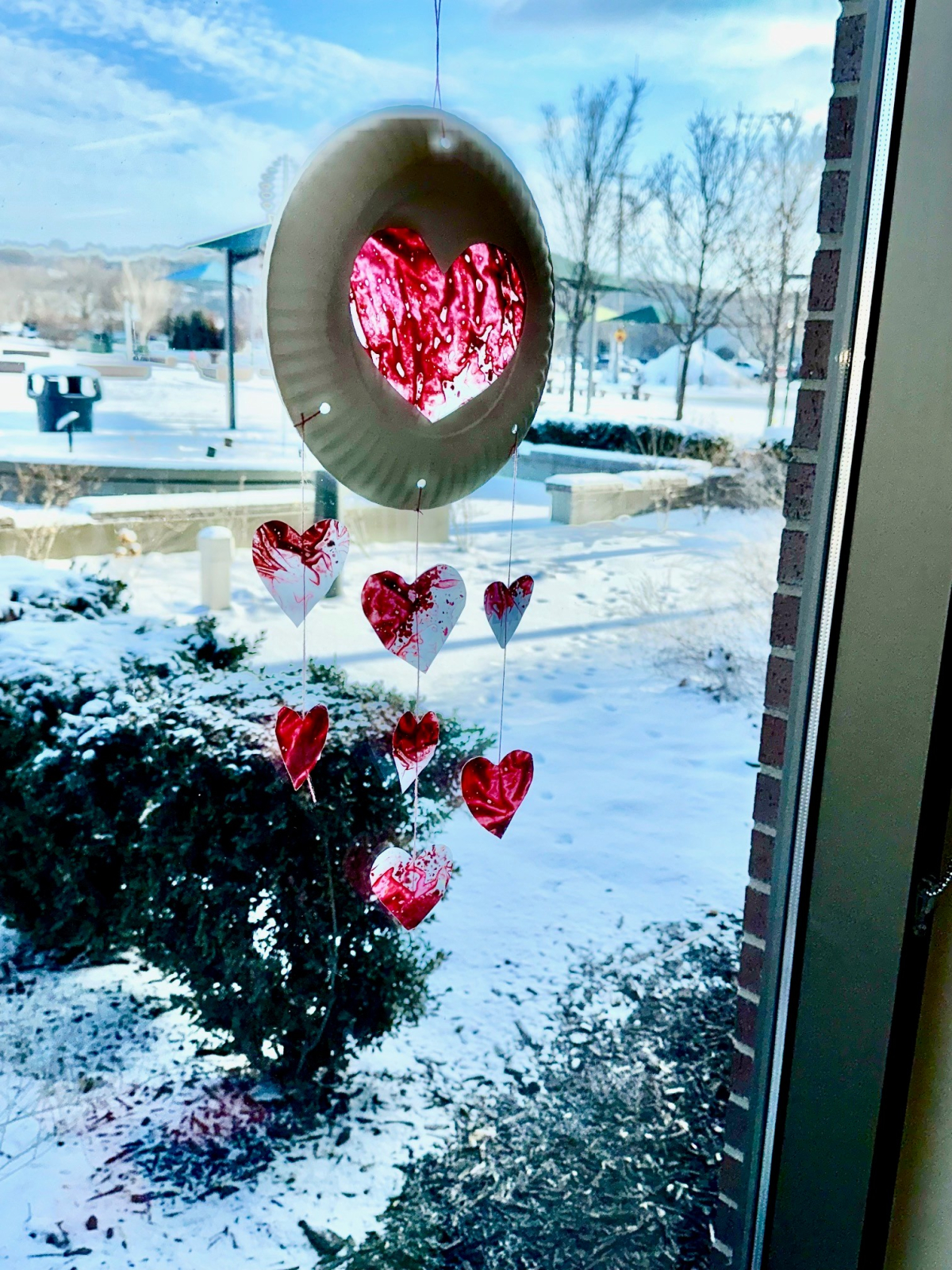 heart shaped suncatcher in a window